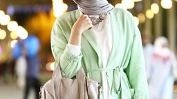 <b>3. </b>بالصور ... اناقة وشياكة المحجبات مع دلاليد