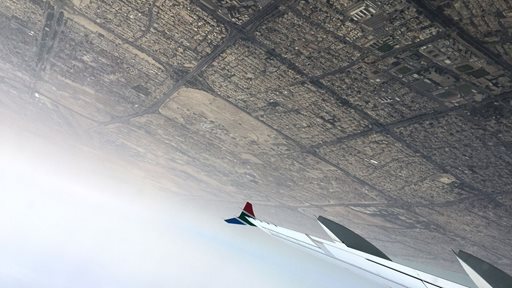 Photos of Kuwait taken from the plane during the day and night
