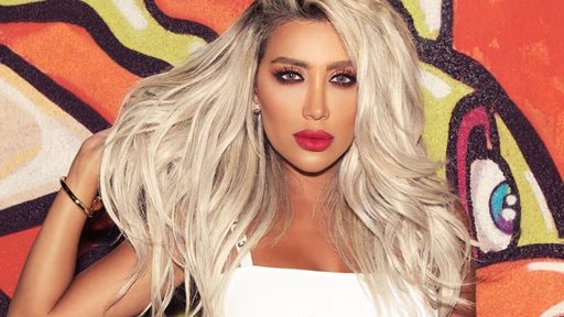 Maya Diab with Hair Cover and Sunglasses at Night