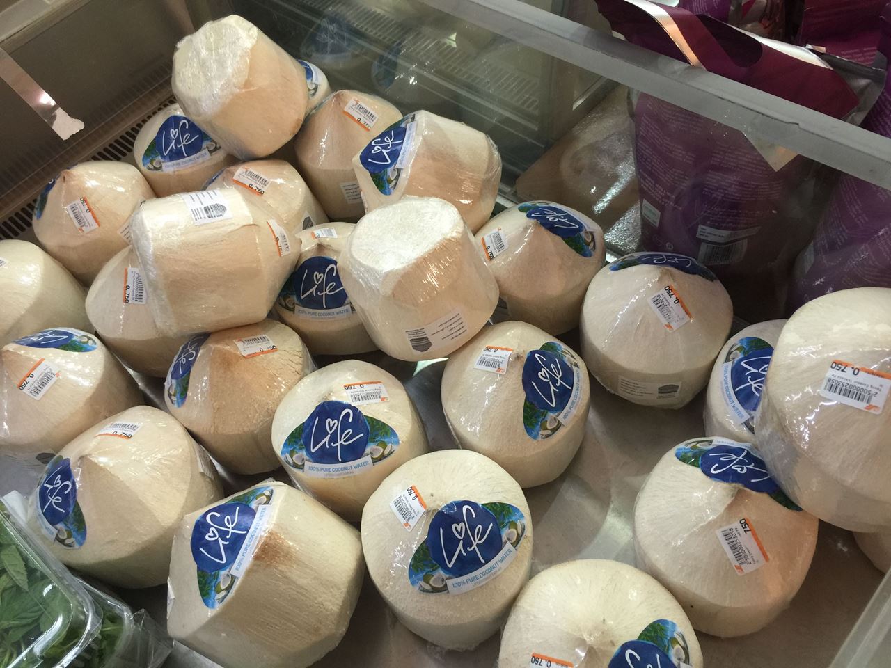 Fresh Thai coconuts at Sultan Center