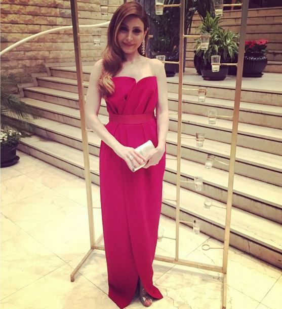 Lebanese singer Yara in a long red dress