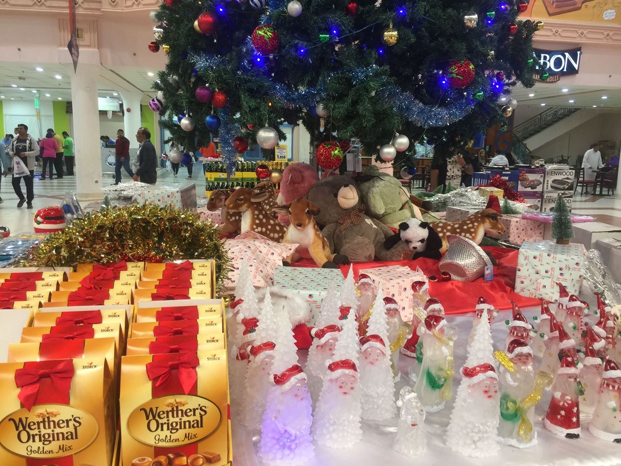 Christmas accessories surrounding the tree