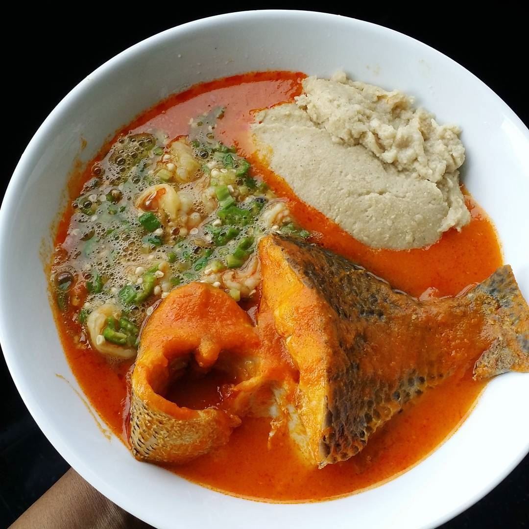 Fresh tilapia and seabass stew with okra and oat fufu