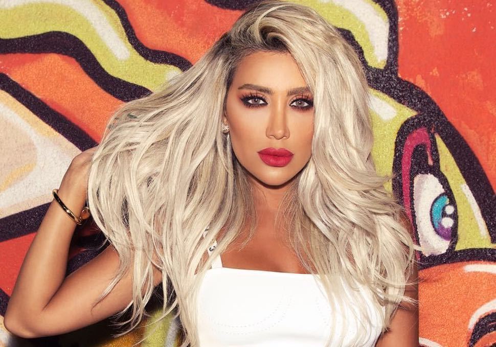 Maya Diab with Hair Cover and Sunglasses at Night