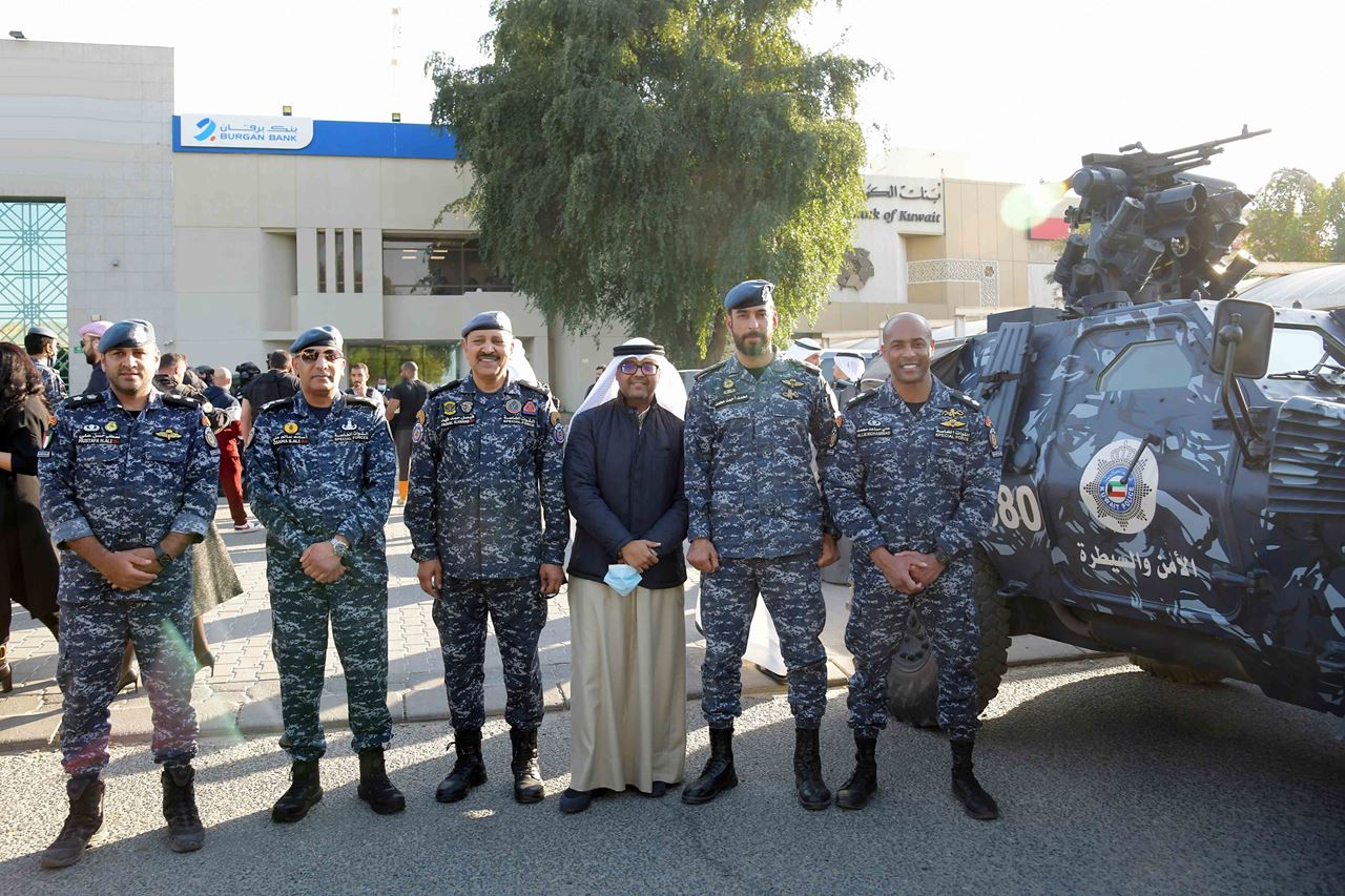 Eng. Saud Al-Hadbah, Head of the Public Services Department at Burgan Bank amid MOI team