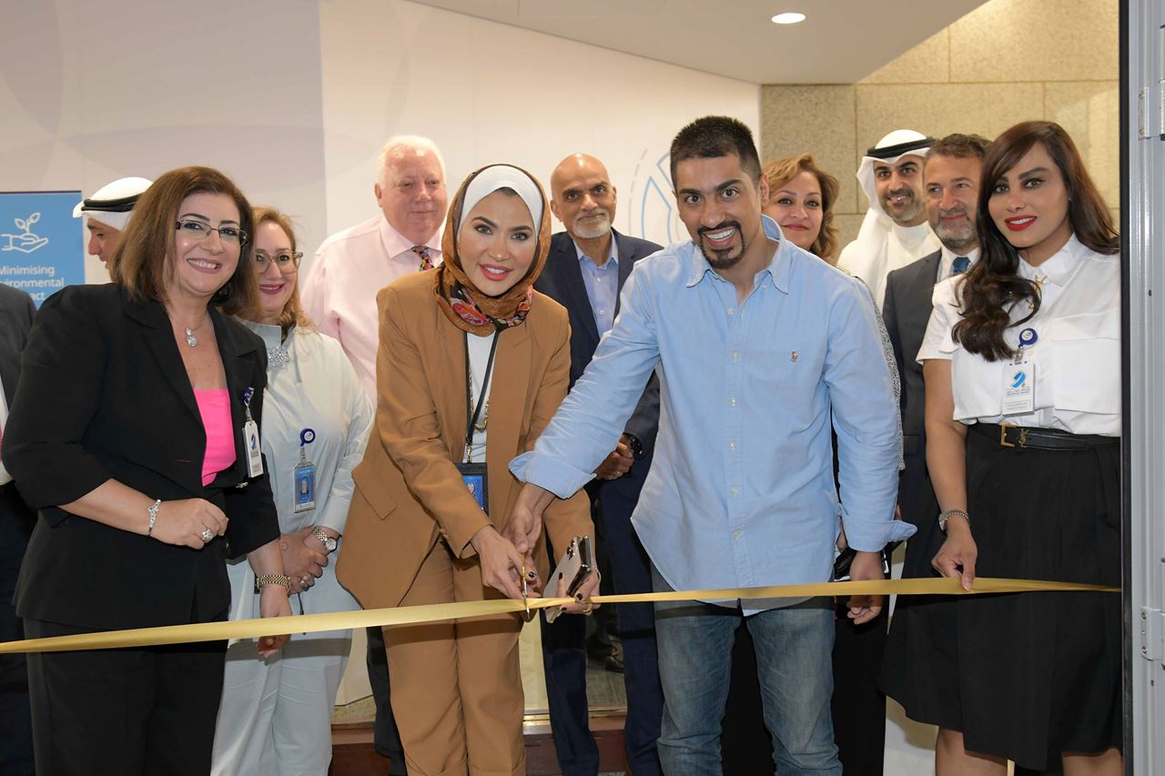 Mr. Ali Al Zankawi and Mrs. Halah El Sherbini with the Burgan Bank team during the launch event