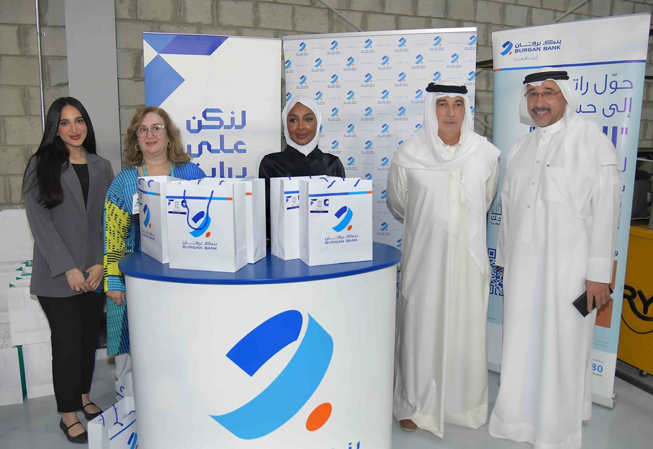 Dr. Hamad AlHasawi – Secretary General at Kuwait Banking Association, Mr. Masoud M. J. Hayat, Vice Chairman and Group CEO of Burgan Bank Group, and Ms. Kholoud AlFeeli, Group Head - Corporate Communications, with the Burgan team at the bank’s booth during the tournament