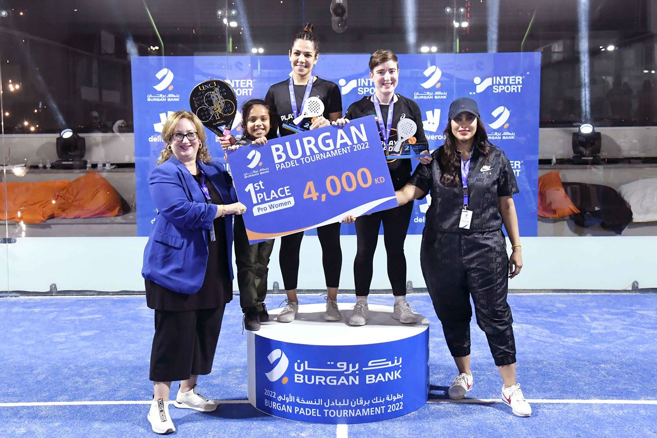 Ms. Kholoud Rida AlFeeli, Group Head-Corporate Communications at Burgan Bank, and Ms. Hessa Hussain Al-Najadah, Senior Manager of Corporate and CSR Communications at Burgan Bank, honoring winners