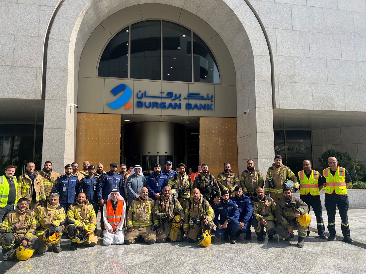 Burgan Bank employees with the Kuwait Fire Force team