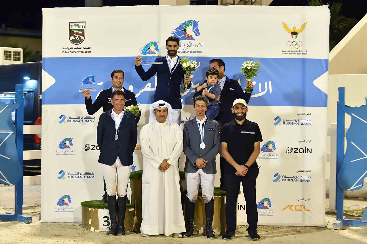 Mr. Qutaibah Ahmad Al-Rabe, Head of Digital and Marketing Communications at Burgan Bank, with the winners