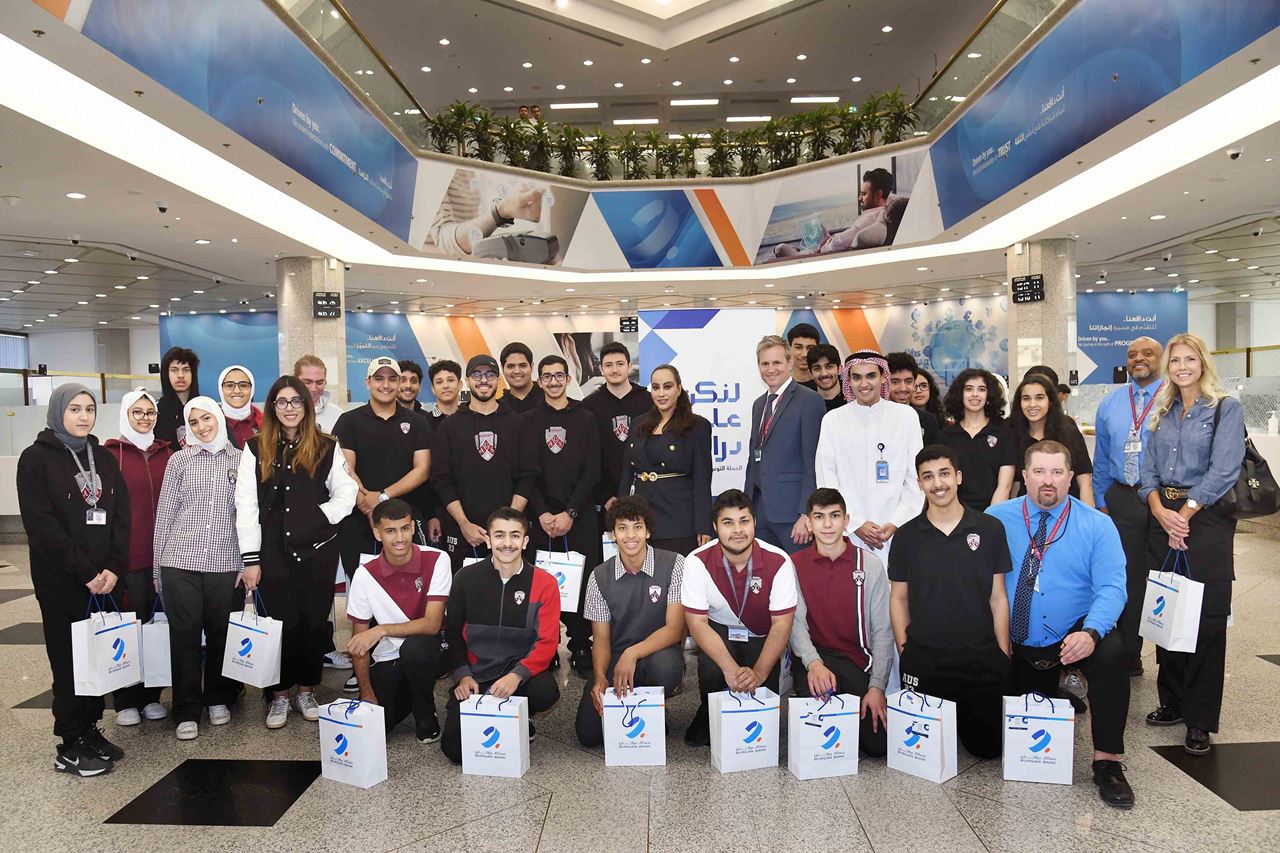 The Burgan Bank team with the visiting students