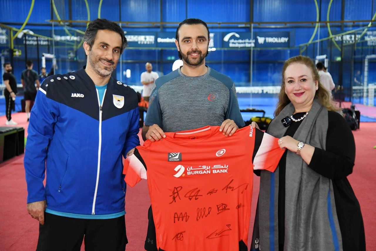 Mrs. Kholoud Abdulredha Al-Feeli, Head of Corporate Communications at Burgan Bank with the Padel team